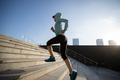 Fitness sports woman running up stairs in city - PhotoDune Item for Sale