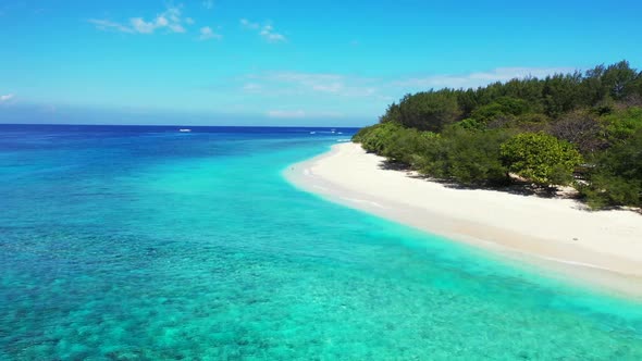 Aerial landscape of idyllic sea view beach holiday by blue ocean and clean sandy background of a day