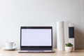 Comfortable workplace with open blank screen laptop for mock up - PhotoDune Item for Sale