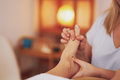 Woman having foot reflexology massage in salon - PhotoDune Item for Sale