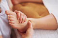 Woman having foot reflexology massage in salon - PhotoDune Item for Sale