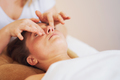 Woman having japan style face massage in salon - PhotoDune Item for Sale