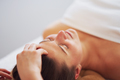 Woman having japan style face massage in salon - PhotoDune Item for Sale