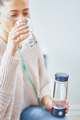 Picture of woman having hydrogen water in hand - PhotoDune Item for Sale