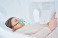 Picture of brunette woman in oxygen cabin - PhotoDune Item for Sale