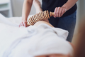 Woman at massage therapy with wooden tools - PhotoDune Item for Sale