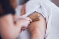 Woman at massage therapy with wooden tools - PhotoDune Item for Sale