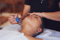 Woman having a face cupping massage in salon - PhotoDune Item for Sale