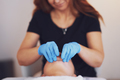 Woman having mouth massage in blue gloves - PhotoDune Item for Sale
