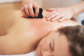 Woman having a gua sha massage in salon - PhotoDune Item for Sale