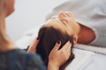 Picture of an treatment that involves gently touching 32 points on your head - PhotoDune Item for Sale