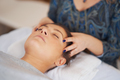 Picture of an treatment that involves gently touching 32 points on your head - PhotoDune Item for Sale