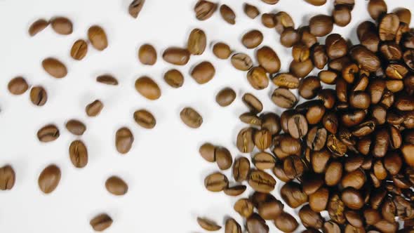 The Coffee Beans Spin Rotate Quickly Fast Fly Dispart Splash to the Sides with Centrifugal Coriolis