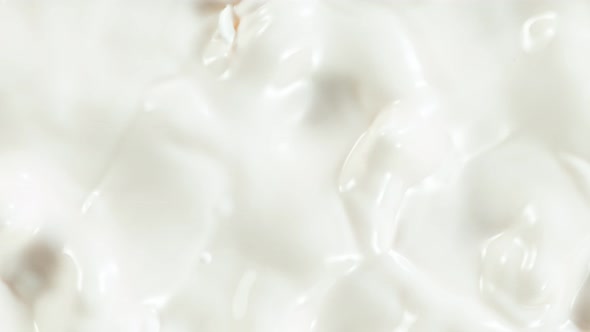 Super Slow Motion Shot of Swirling Fresh Cream at 1000Fps