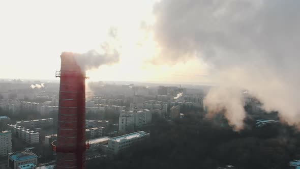 Industrial Concept - Smoke Coming Out of a Pipe - Atmospheric Pollution of the City