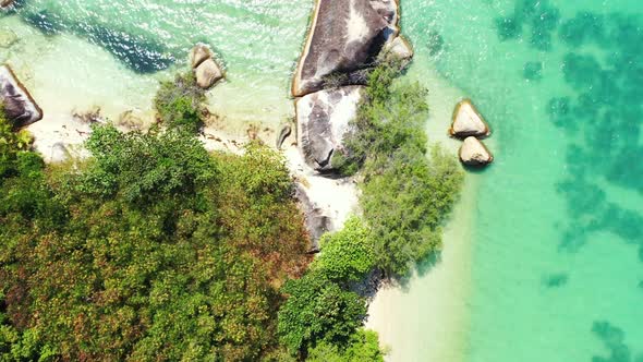 Aerial panorama of luxury seashore beach adventure by aqua blue sea and white sand background of a d