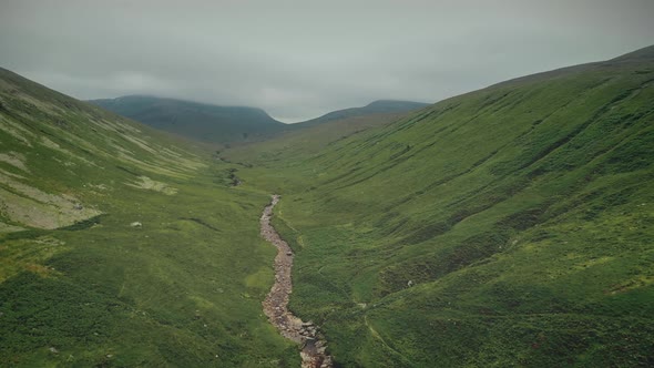 Green Scotland Mountains Path Aerial Shot