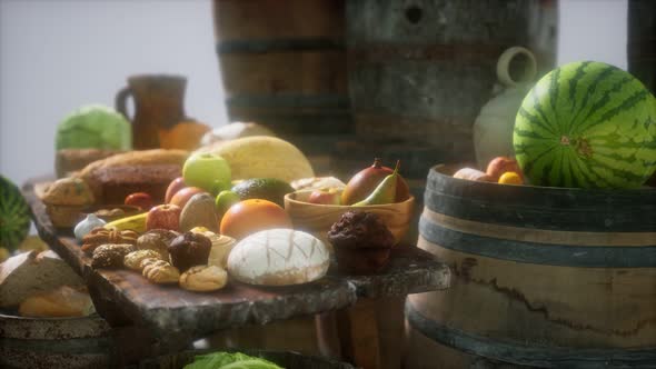 Food Table with Wine Barrels and Some Fruits, Vegetables and Bread