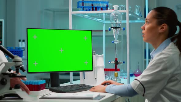 Chemist Typing on Keyboard Works with Green Chroma Key Screen Pc
