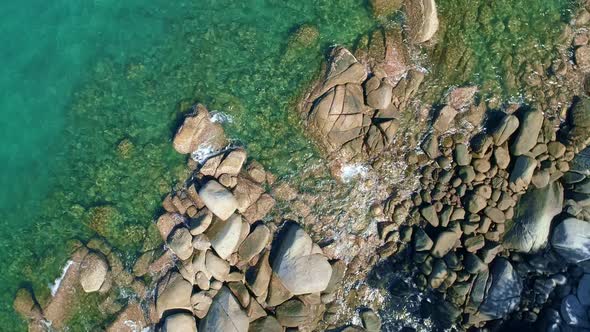 seashore rocks in Phuket ocean Sea waves crashing on rocks cliff seascape