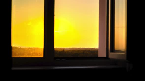 Sunset in the Sky Through Silhouette of the Window Timelapse