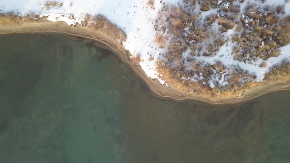 Coastline Of Lake In Wintertime