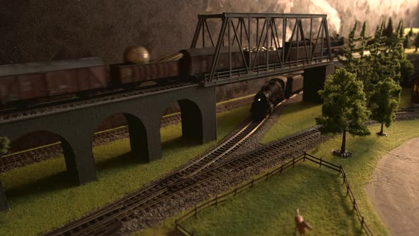 Model of Freight Steam Train Crossing the Bridge.