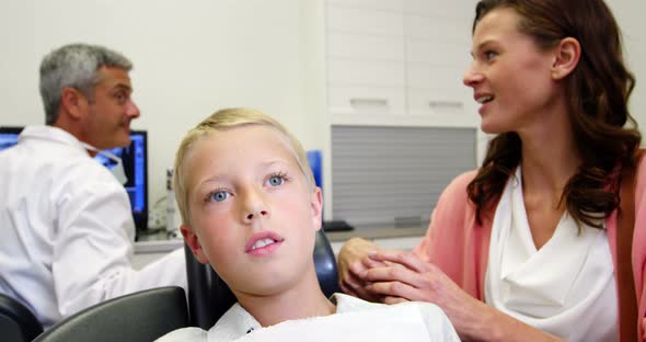 Mother and son at dental clinic