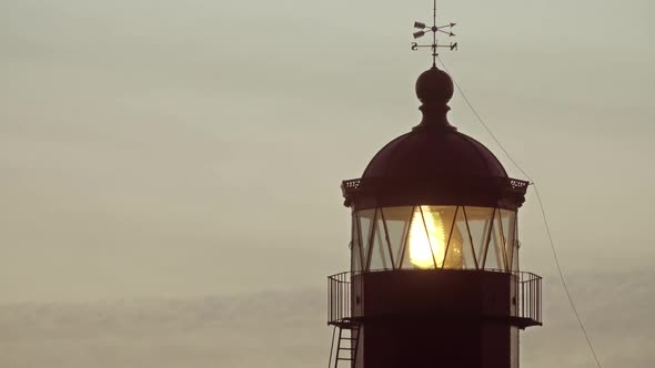 Lighthouse Lighting in the Twilight at Sunset
