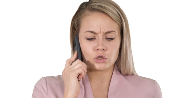 Smiling woman talking on the phone on white background