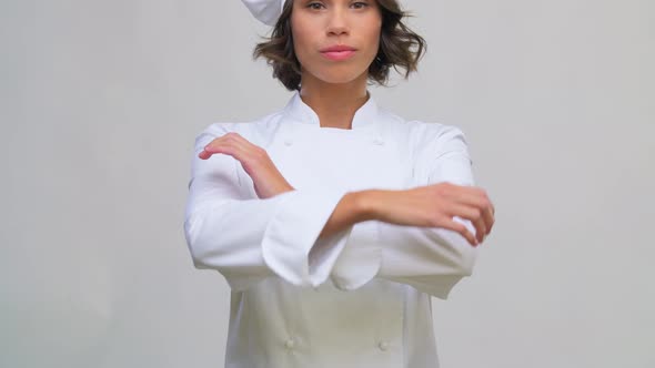 Smiling Female Chef in Toque