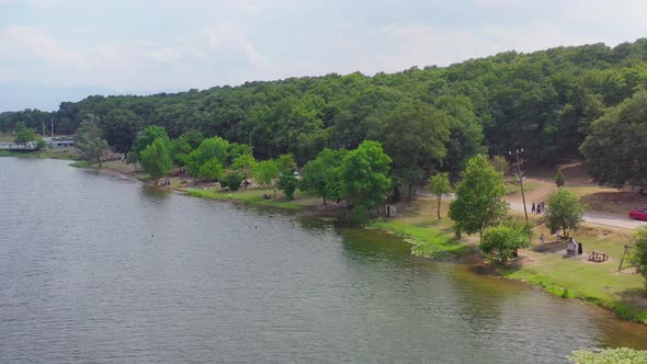 aerial shot of picnic place in lake and forest