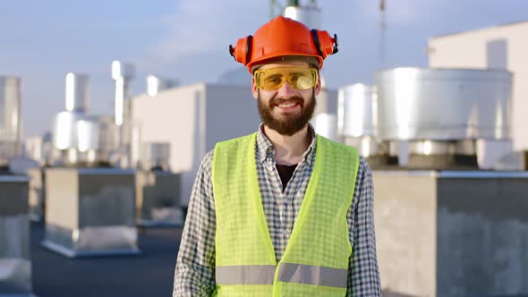 Portrait of a Smiling Large Engineer Man Posing in