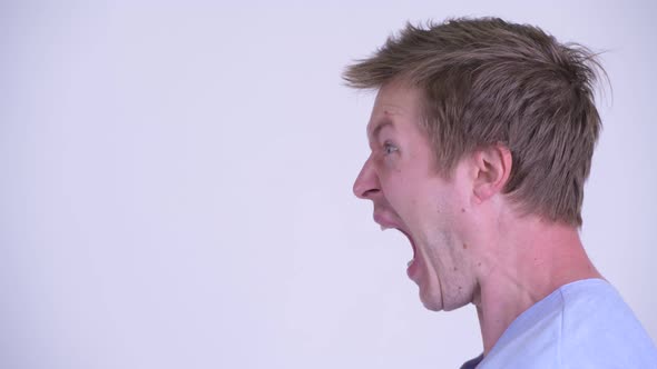 Face of Stressed Young Man Patient Looking Angry and Shouting