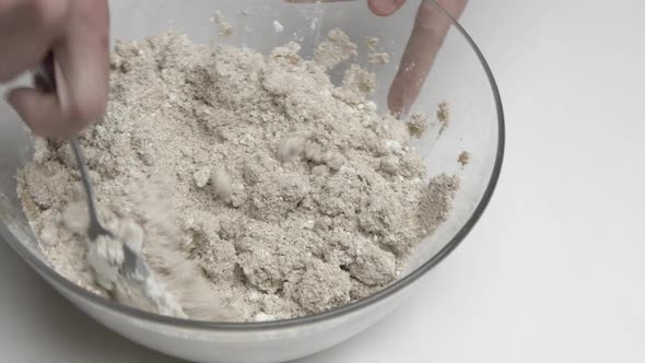 Hands Kneading Concrete for Making Handmade Candles