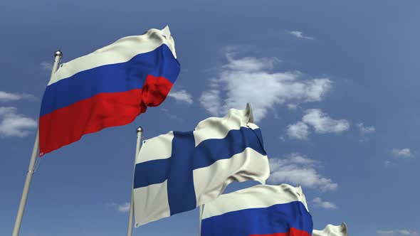 Row of Waving Flags of Finland and Russia