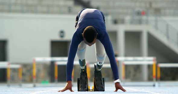 Disabled athletic running on a running track 4k