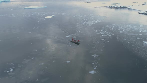 Zodiac Boat Sail Brash Ice Tracking Aerial View