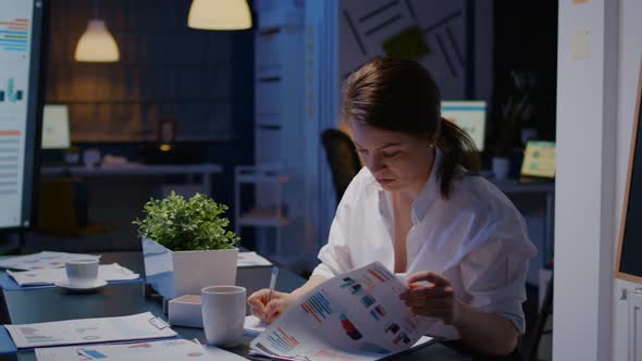 Workaholic Businesswoman Working in Company Office Meeting Room Writing Financial Statistics