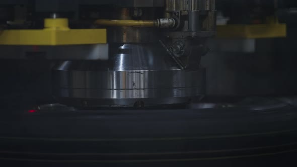 Closeup Tyre Stamping Machine Working Process at Technological Manufacture
