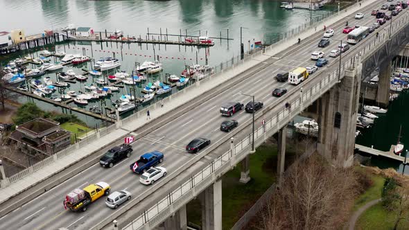 Freedom Convoy Protest In Canada. Vehicles With Canadian Flags At Burrard Street Bridge Over False C