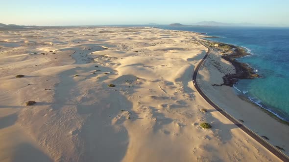 Aerial view of cars road in seaside at Corralejo Dunes, Fuerteventura.