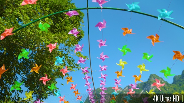 4K Many Colorful Pinwheels Spin in the Wind