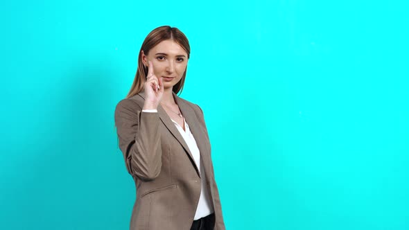 Assertive Woman, Aged 20-30, in Business Jacket, Making Blows