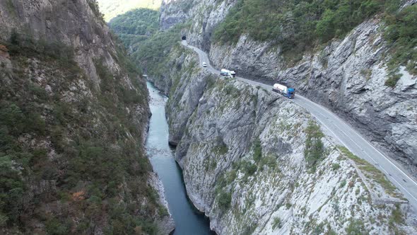 Aerial view of Tara river canyon, big mountains and road Montenegro, Europe