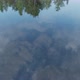 Reflections of clouds and trees in the water, water ripples - VideoHive Item for Sale