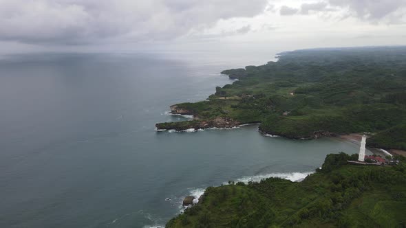 Aerial view of the lighthouse in Indonesian beach