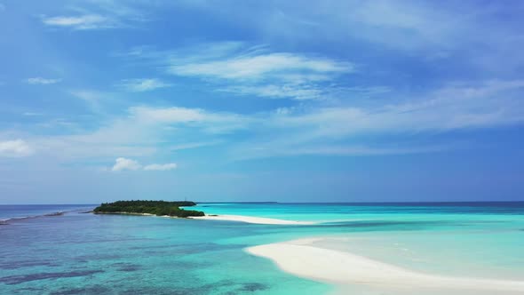 Aerial top view nature of idyllic coastline beach lifestyle by blue lagoon with white sand backgroun