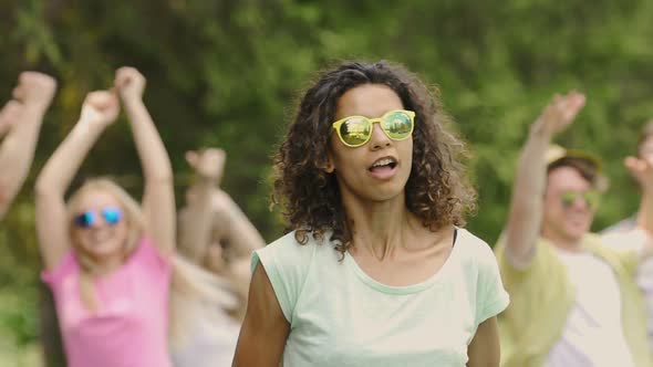 Young Happy People Shooting Music Video, Actively Dancing, Smiling for Camera