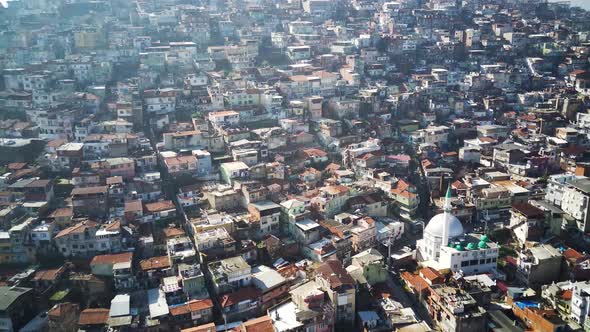 Drone view on poverty slum district and muslim mosque